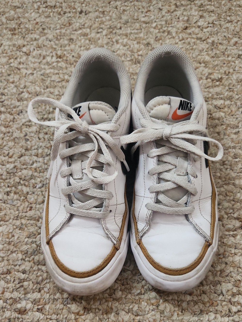Nike Boy's White Sneakers with Gold Accent and Black Swoosh